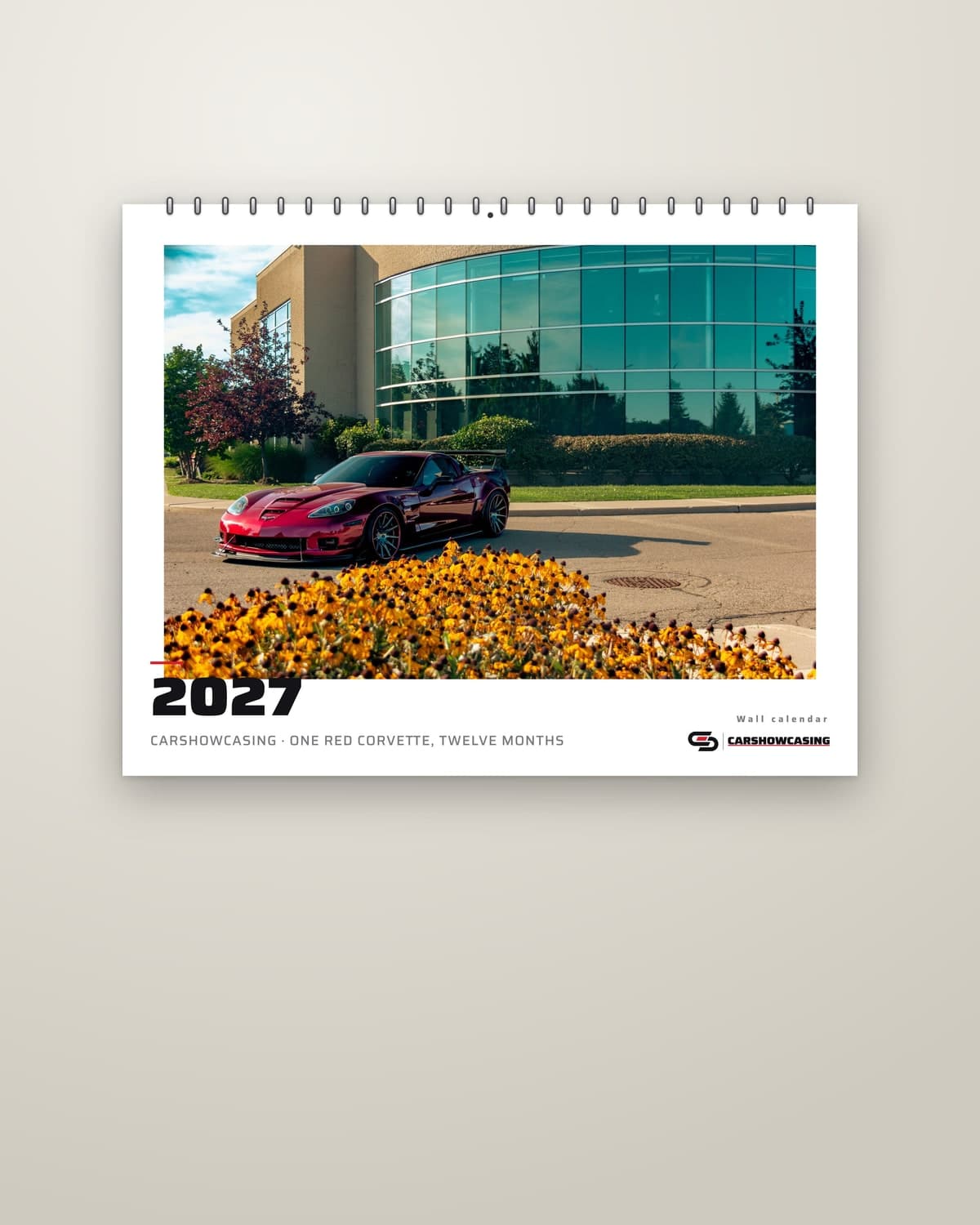 2027 Red Widebody Calendar, cover, hanging on a wall (render of the printed pages)