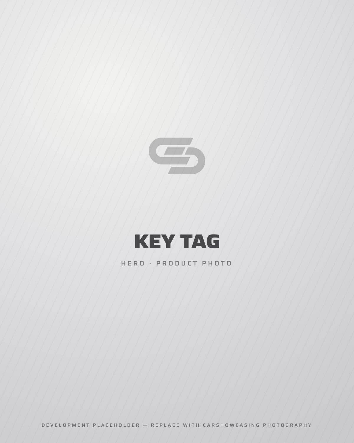 Metal key tag with engraved mark
