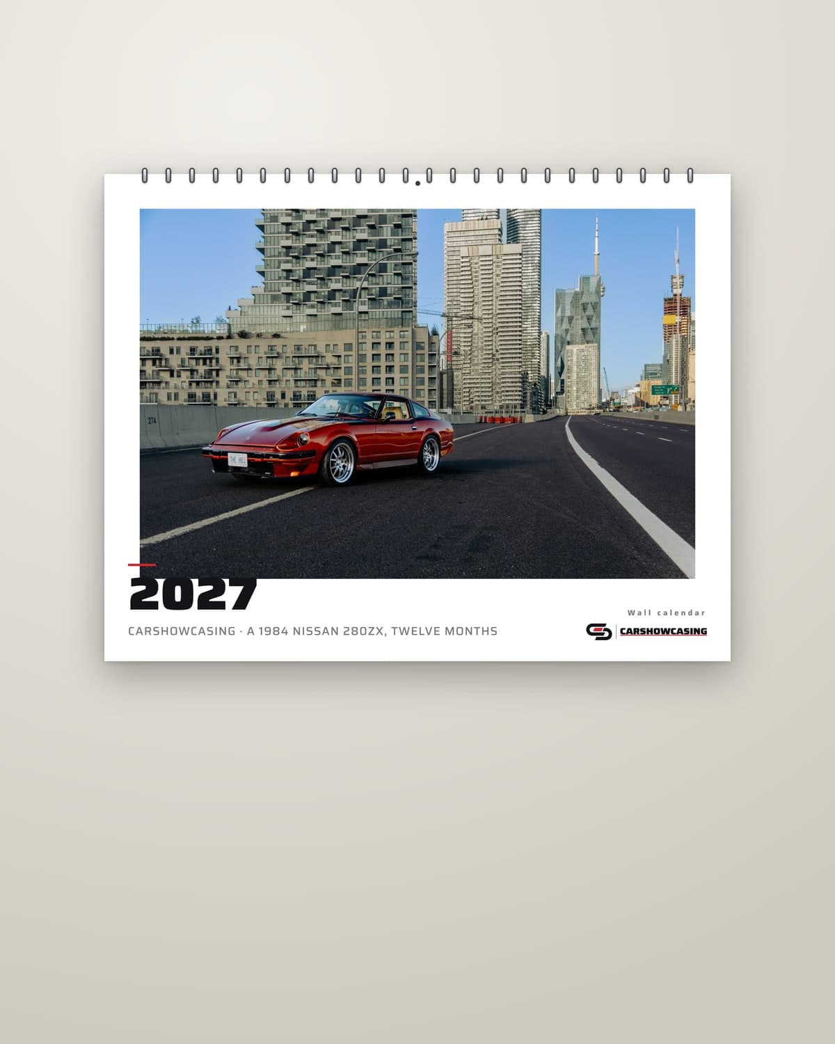 2027 JDM Calendar, cover, hanging on a wall (render of the printed pages)