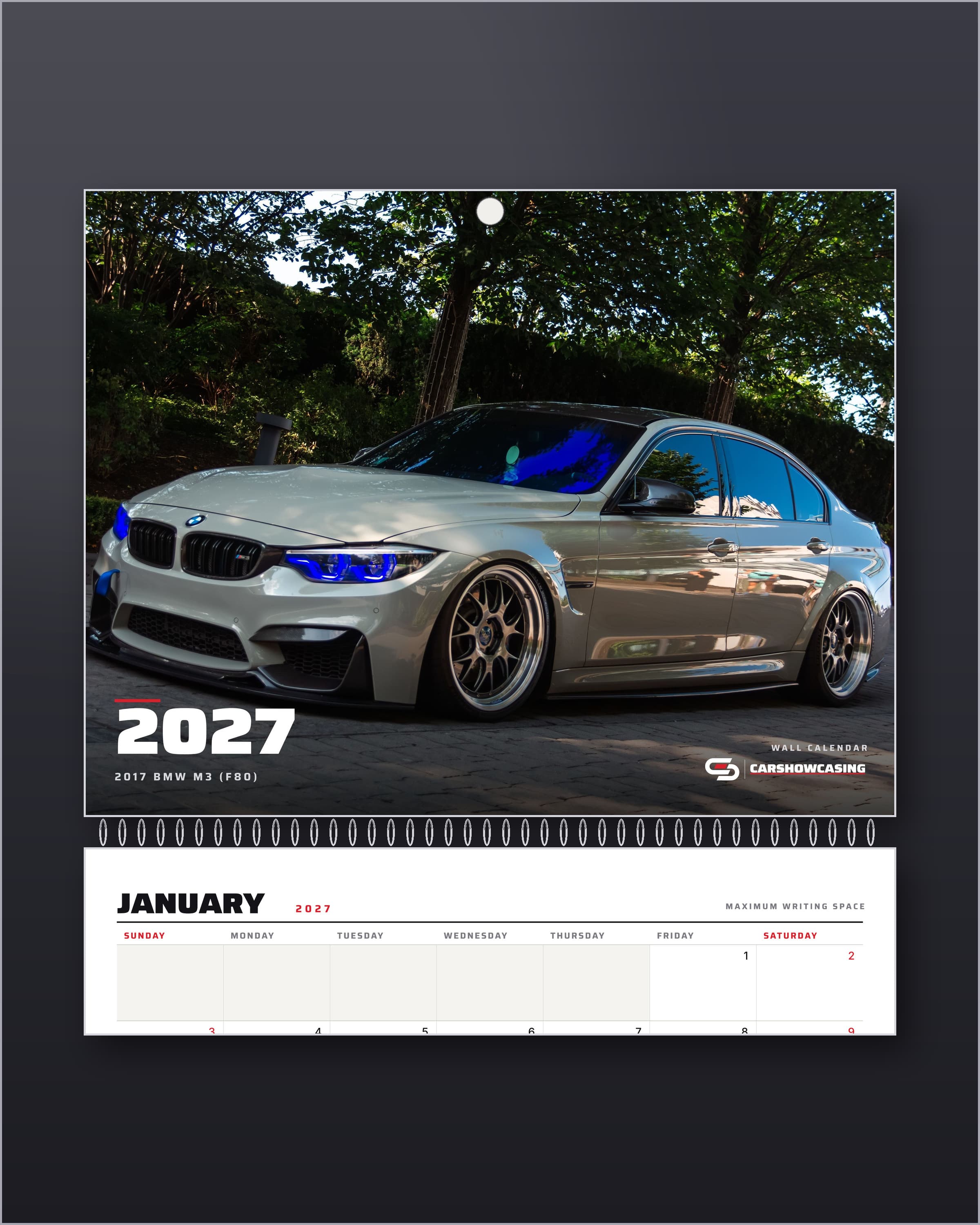 2027 BMW M3 wall calendar cover with the January grid below the wire binding