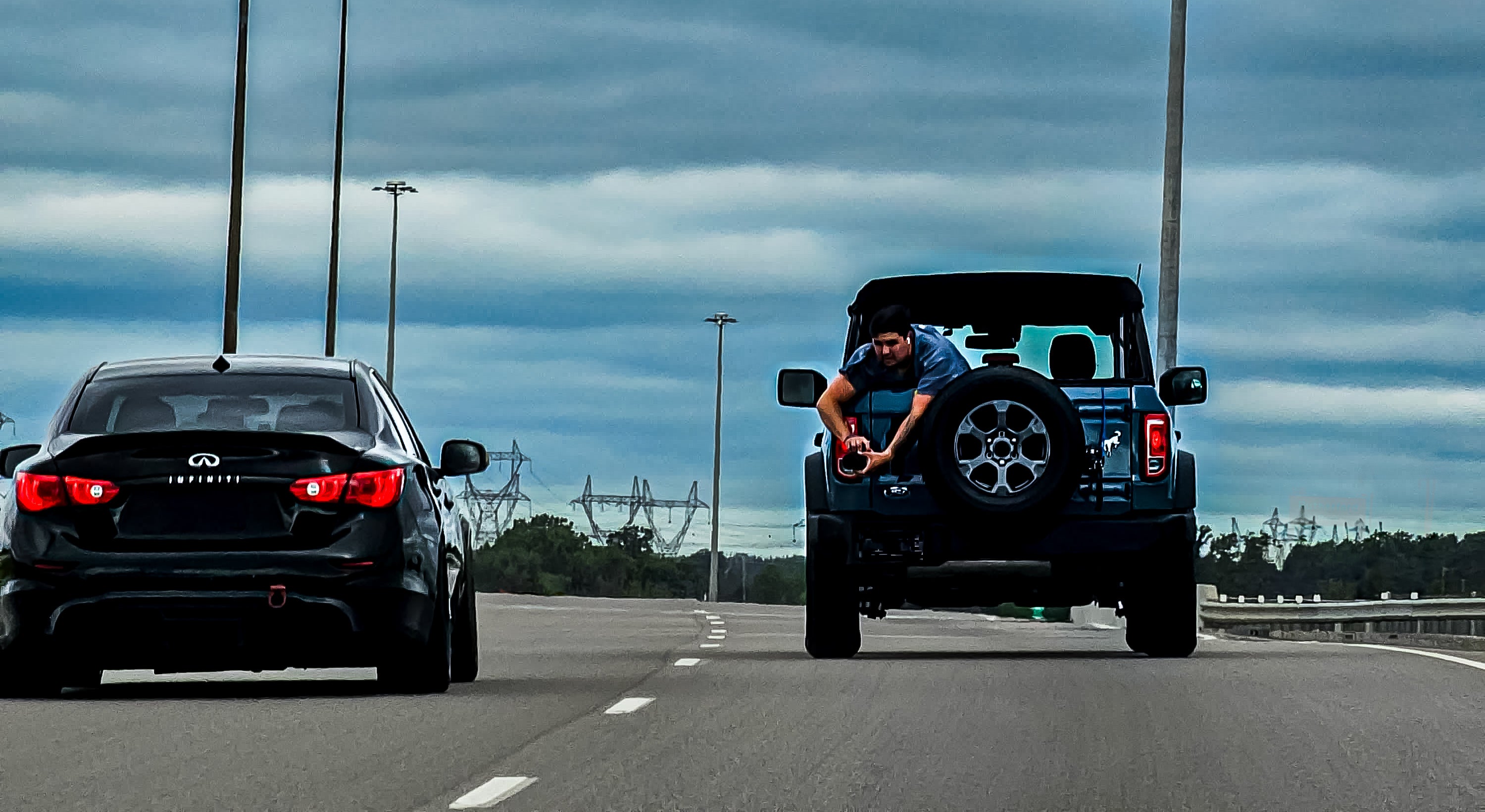 behind the scenes of Brendon doing a roller shot on the highway